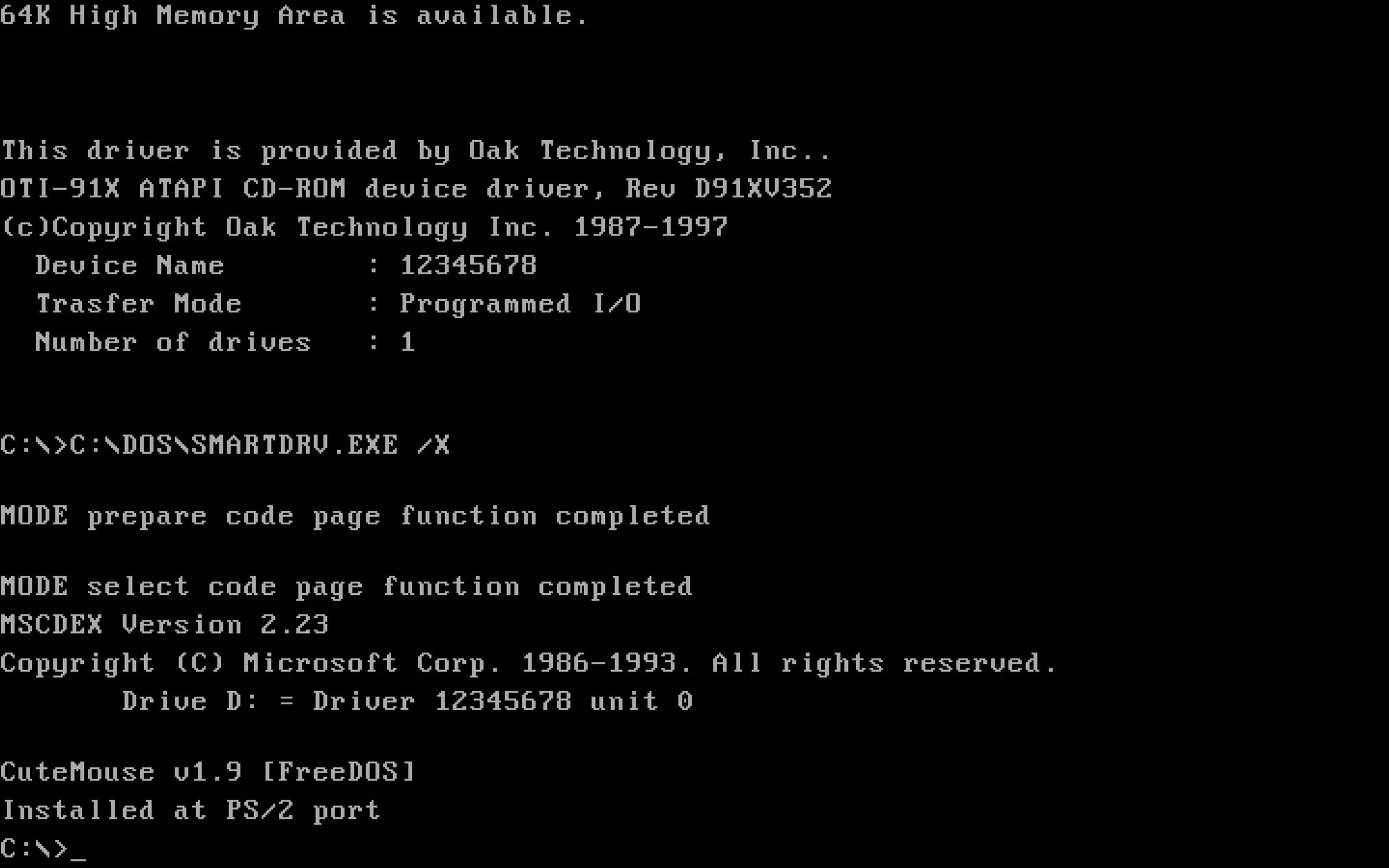 An MS-DOS boot sequence — CD-ROM, mouse, and disk-cache driver messages scrolling past, ending at a blinking `C:>` prompt that waits for a command and offers no hint about what to type