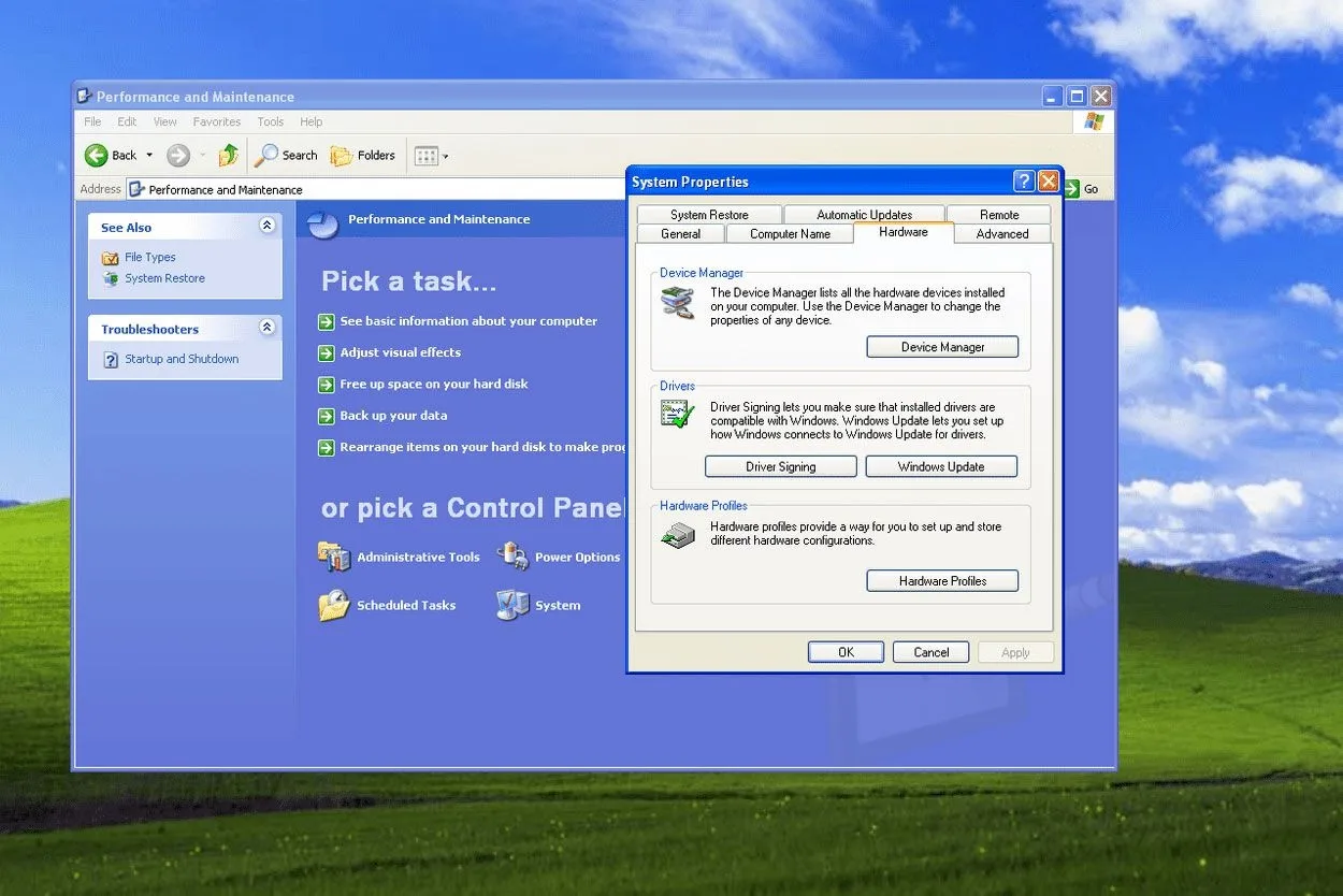 Windows XP's Performance and Maintenance control panel with the System Properties dialog stacked on top of it, open to the Hardware tab — a "Pick a task..." list buried under nested tabs and buttons