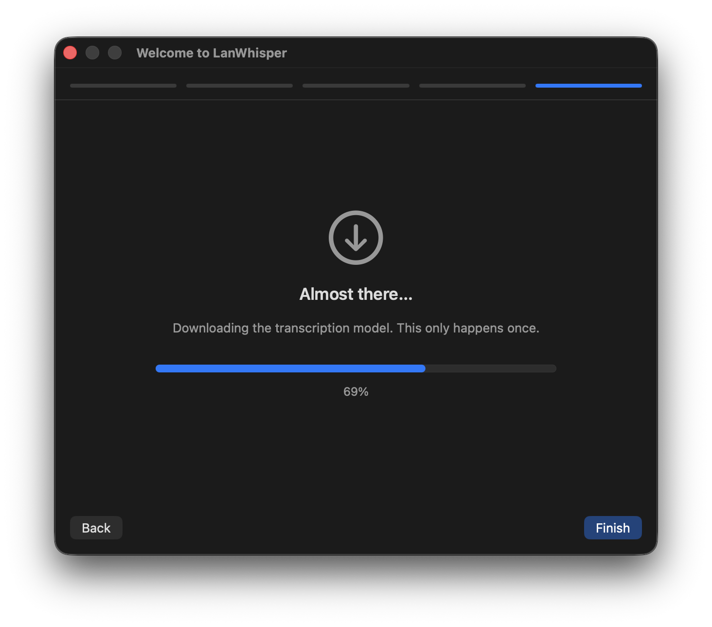 The onboarding "Almost there… Downloading the transcription model. This only happens once." screen, with a progress bar at 69%